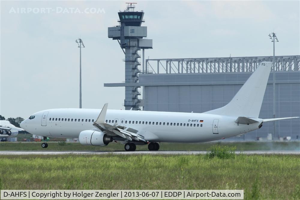 D-AHFS, 2000 Boeing 737-8K5 C/N 28623, Arrival on rwy 08L is passing tower and AN 124 hangar...