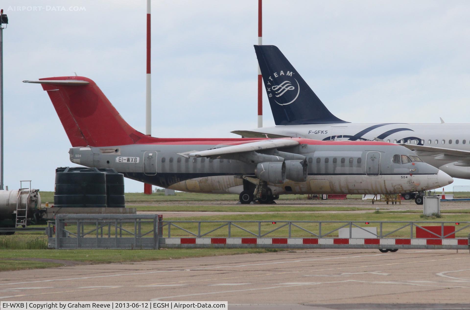 EI-WXB, 1997 British Aerospace Avro 146-RJ85A C/N E2311, Looking in a pretty sorry state and parked at Norwich.