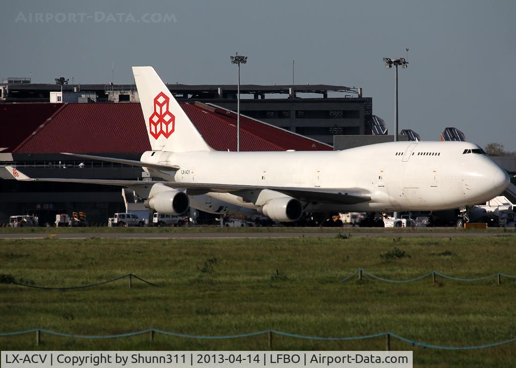 LX-ACV, 1989 Boeing 747-4B5/BCF C/N 24200, Parked at the Cargo area... with logo but no titles...