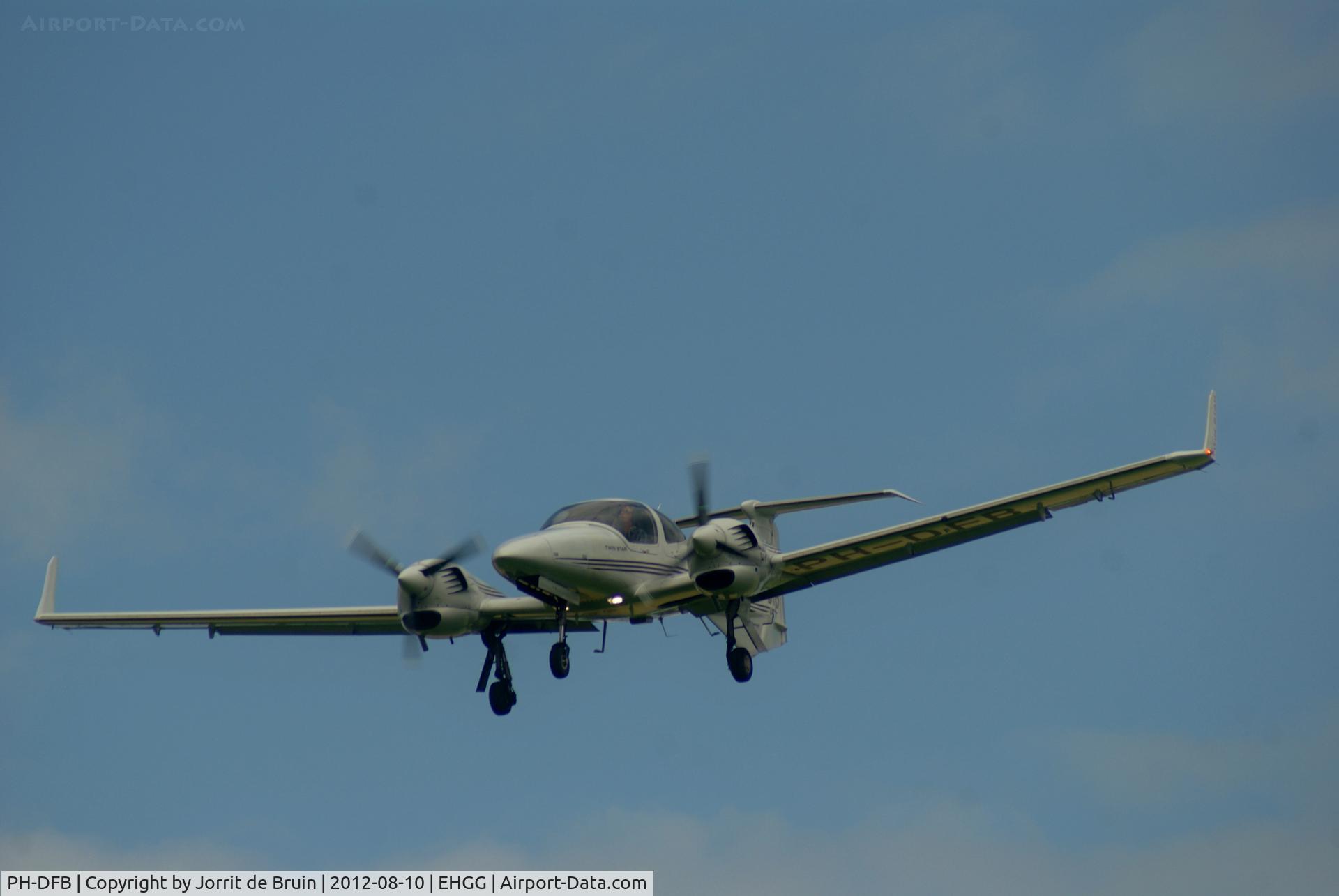 PH-DFB, 2007 Diamond DA-42 Twin Star C/N 42.229, The landings light are on, the gears are down, the flaps are going down, the speed is as quick as lightning... Anyway, the Diamond Twinstar of the Dutch Flight Academy is cleared to land on runway 23 at homebase Eelde!