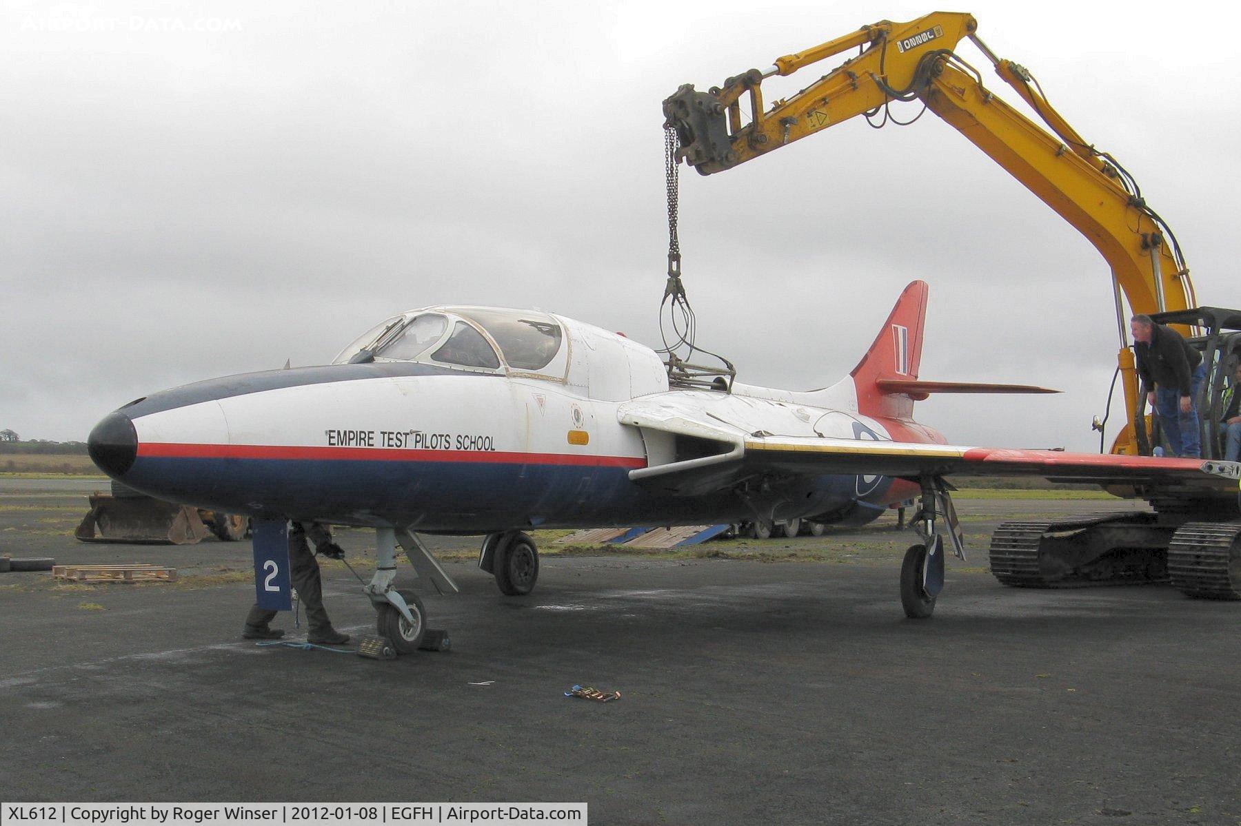 XL612, 1958 Hawker Hunter T.7 C/N 41H-695346, Hawker Hunter being positioned as a 'gate guardian' at Swansea Airport.