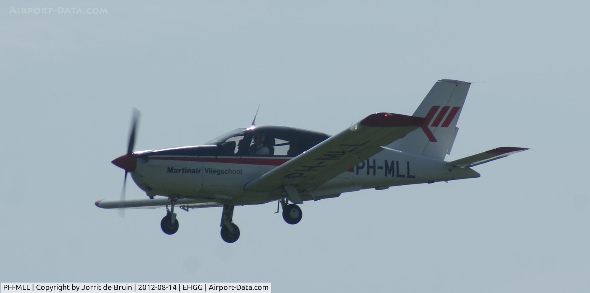 PH-MLL, 2001 Socata TB-20 GA C/N 2038, The Socata from the Martinair Flight Academy in Lelystad visited Eelde for a few touch and goes on runway 05.