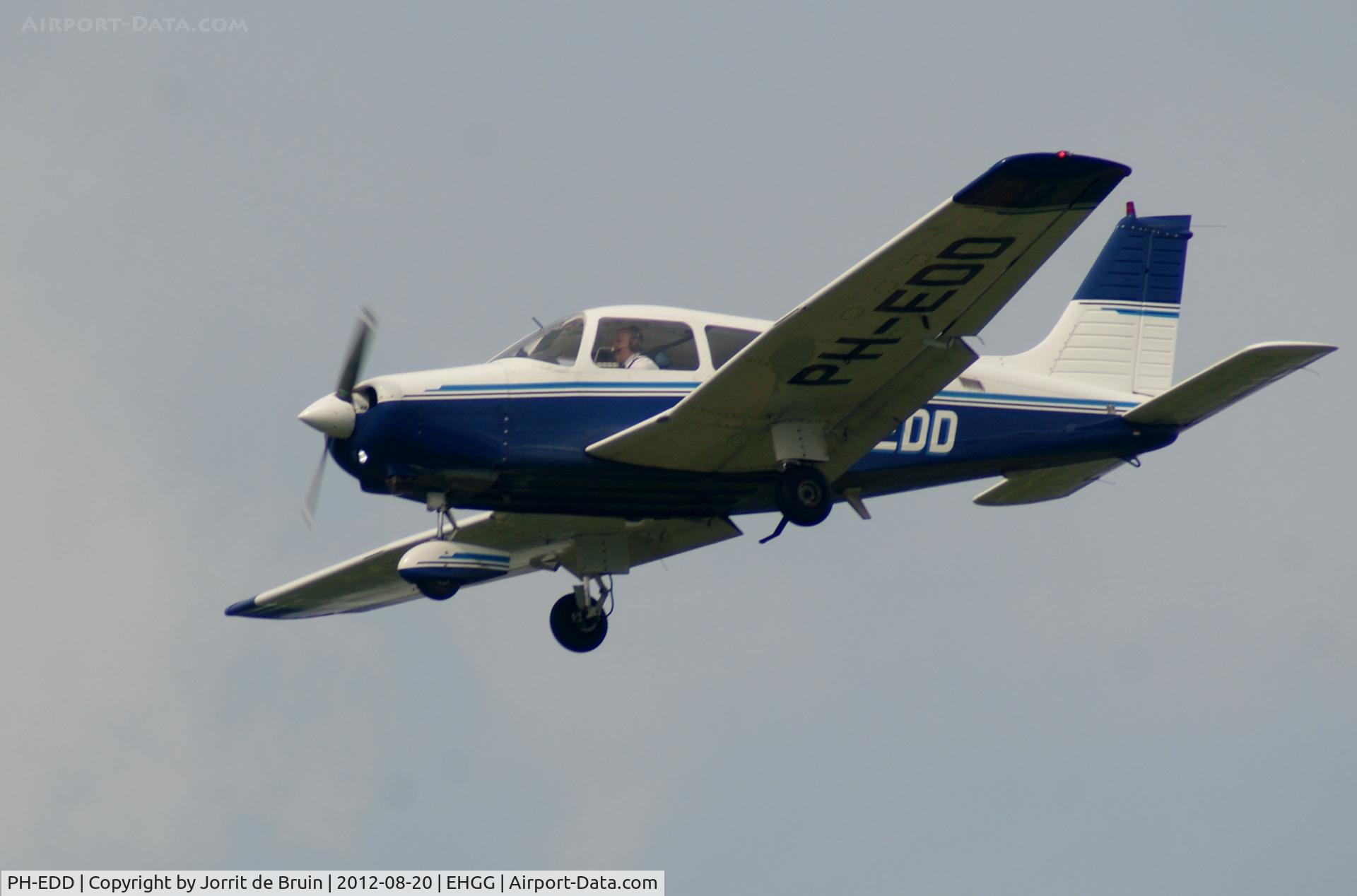 PH-EDD, 1981 Piper PA-28-161 Cherokee Warrior II C/N 28-8116202, The Piper is landing on runway 23 at busy Eelde.