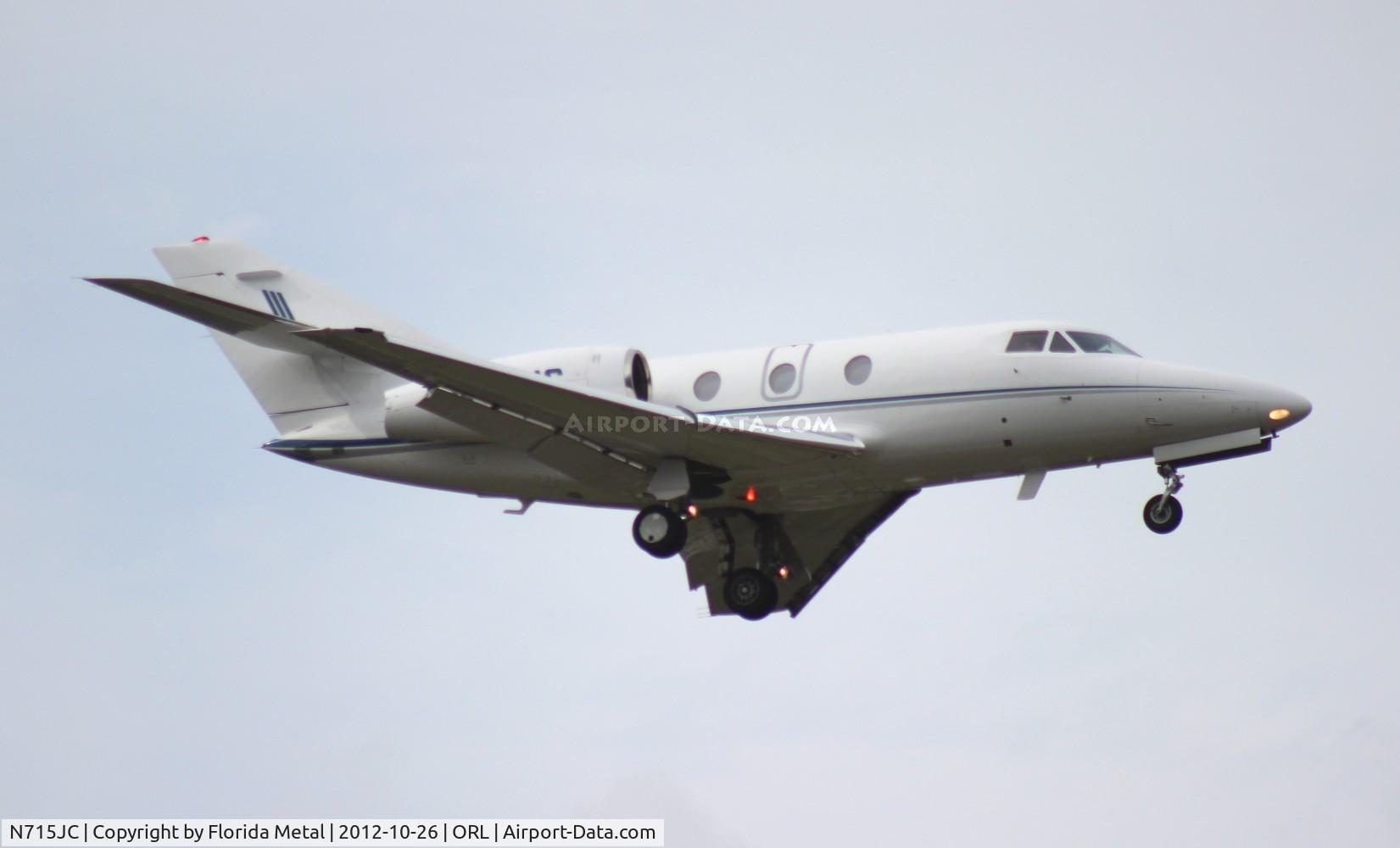 N715JC, 1977 Dassault Falcon 10 C/N 99, Falcon 10 arriving for NBAA as Hurricane Sandy passes off shore