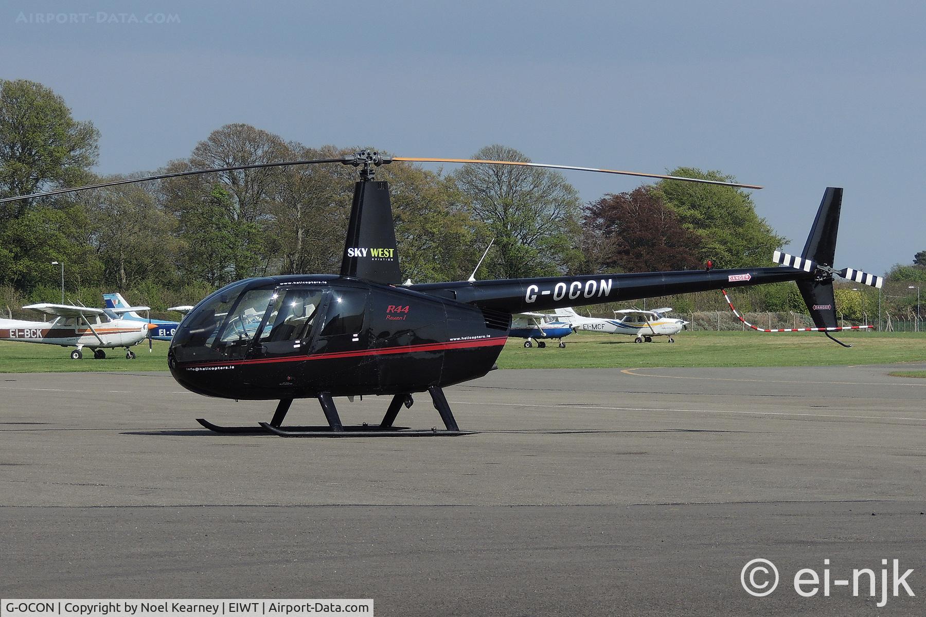 G-OCON, 2006 Robinson R44 C/N 1608, Parked on the ramp at Weston