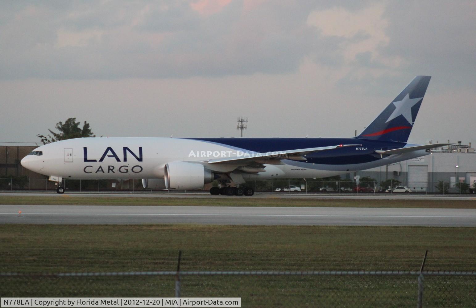 N778LA, 2012 Boeing 777-F6N C/N 41518, LAN Colombia Cargo departing at dusk