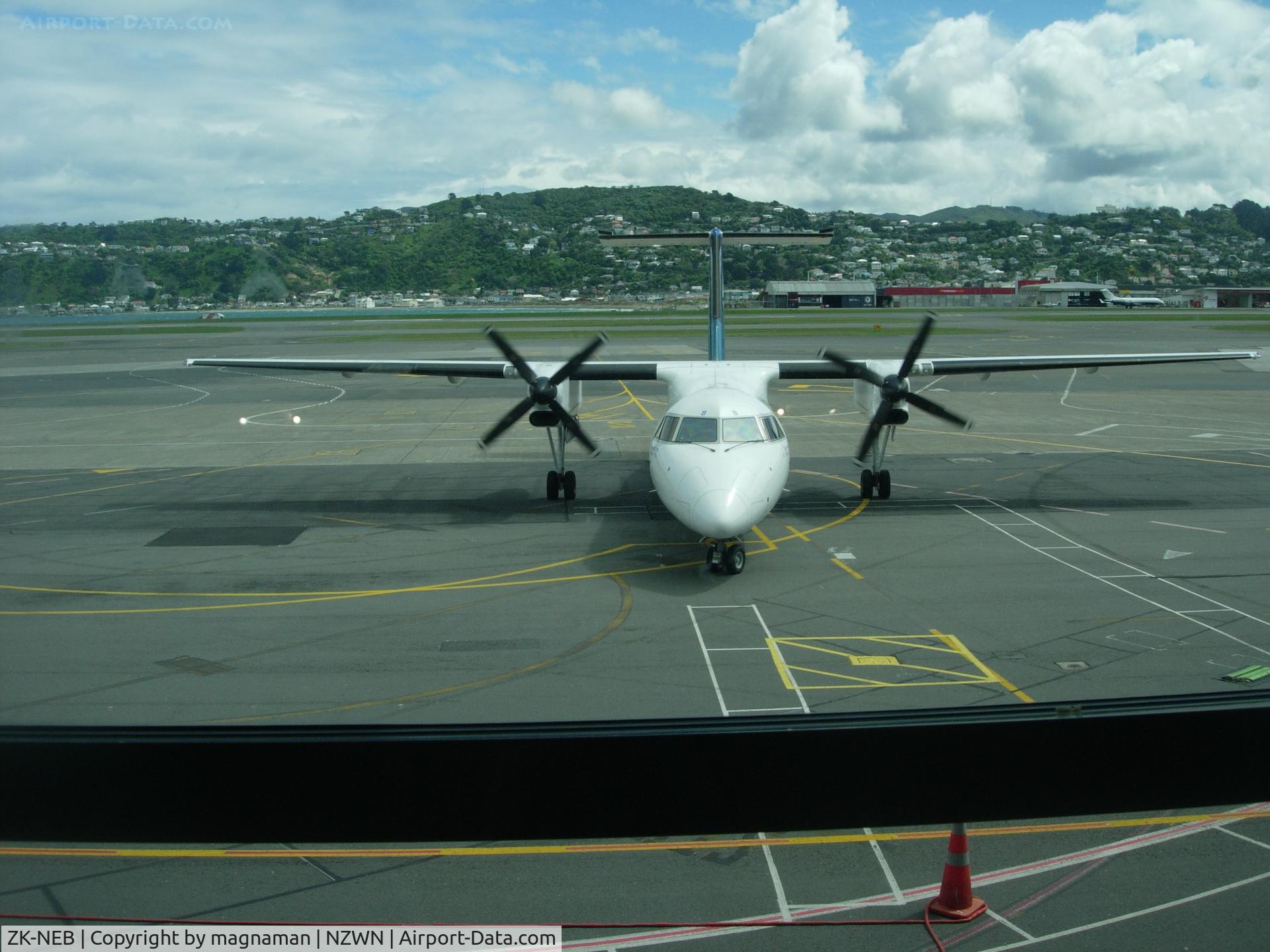 ZK-NEB, 2005 De Havilland Canada DHC-8-311 Dash 8 C/N 615, About to park up after a swift right turn - G-SANL in background on far side of airport