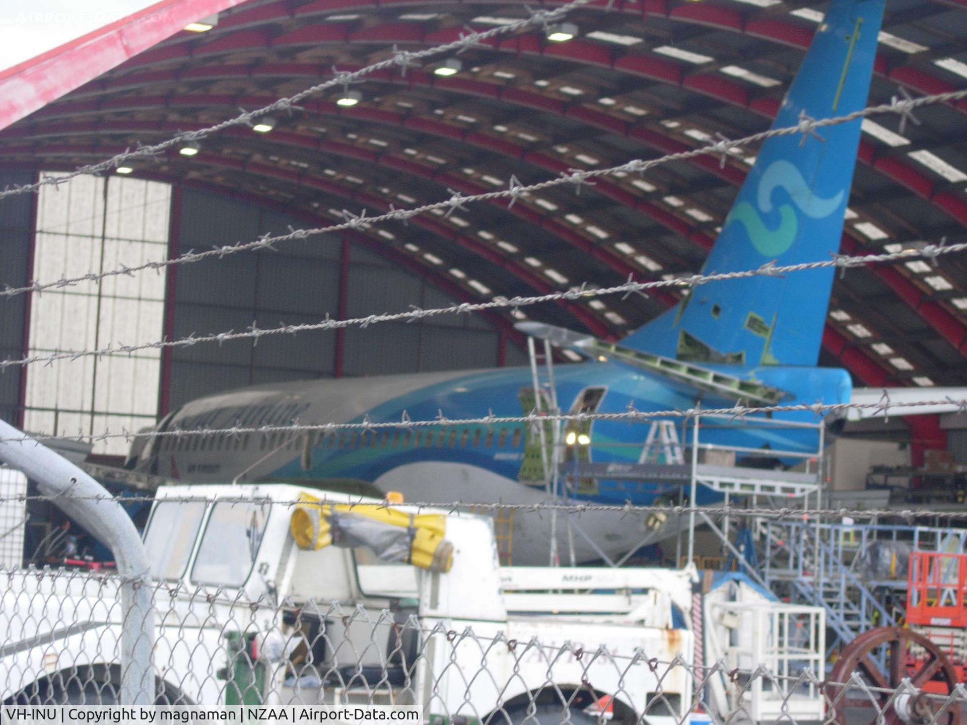 VH-INU, 1987 Boeing 737-3Y0 C/N 23684, Not best view - but stuck inside Airwork hangar for maintenance.