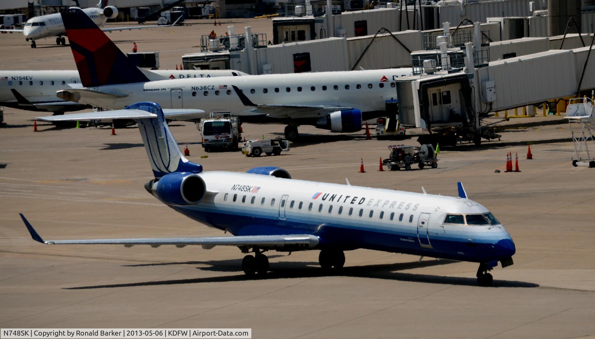 N748SK, 2005 Bombardier CRJ-700 (CL-600-2C10) Regional Jet C/N 10203, Taxi DFW