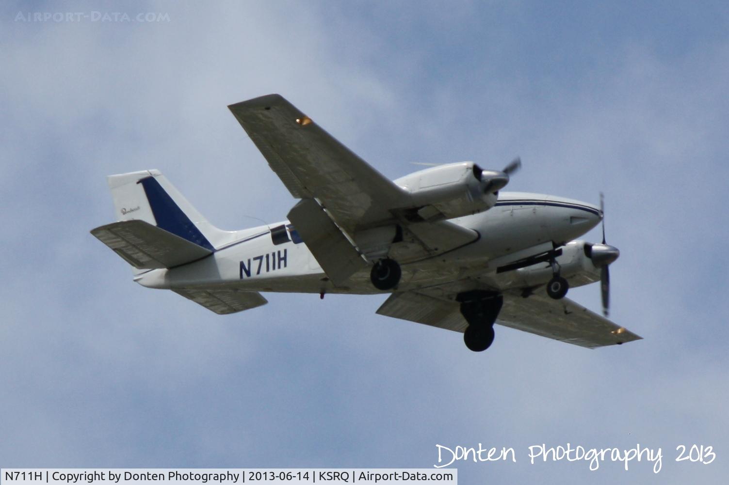 N711H, 1966 Beech 95-B55 (T42A) Baron C/N TC-981, Beechcraft Baron (N711H) on approach for Sarasota-Bradenton International Airport http://planephotographybydontenphotography.blogspot.com/2013/06/beechcraft-baron-n711h.html