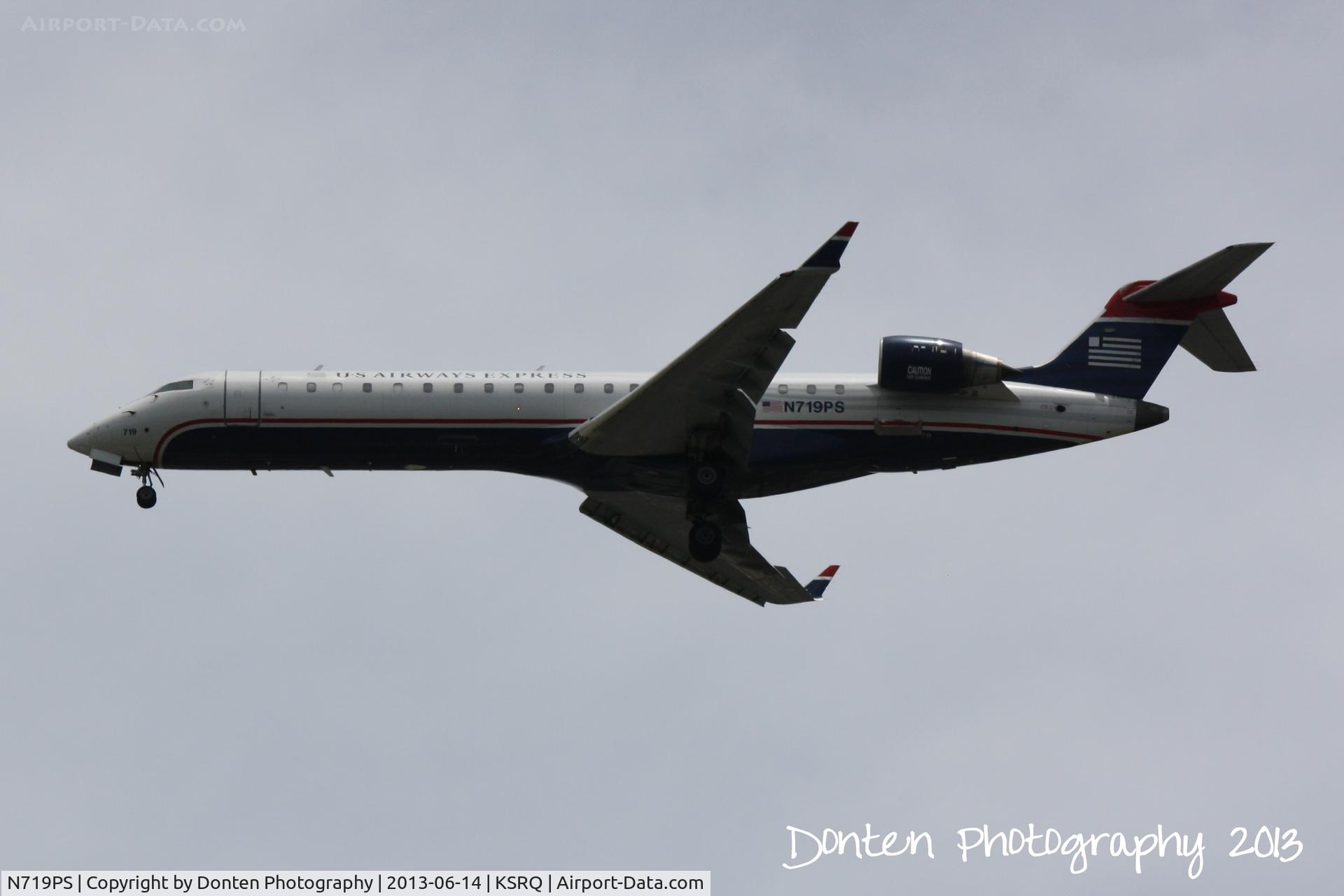 N719PS, 2004 Bombardier CRJ-701 (CL-600-2C10) Regional Jet C/N 10177, US Air Flight 2291 operated by PSA (N719PS) arrives at Sarasota-Bradenton International Airport following a flight from Charlotte-Douglas International Airport