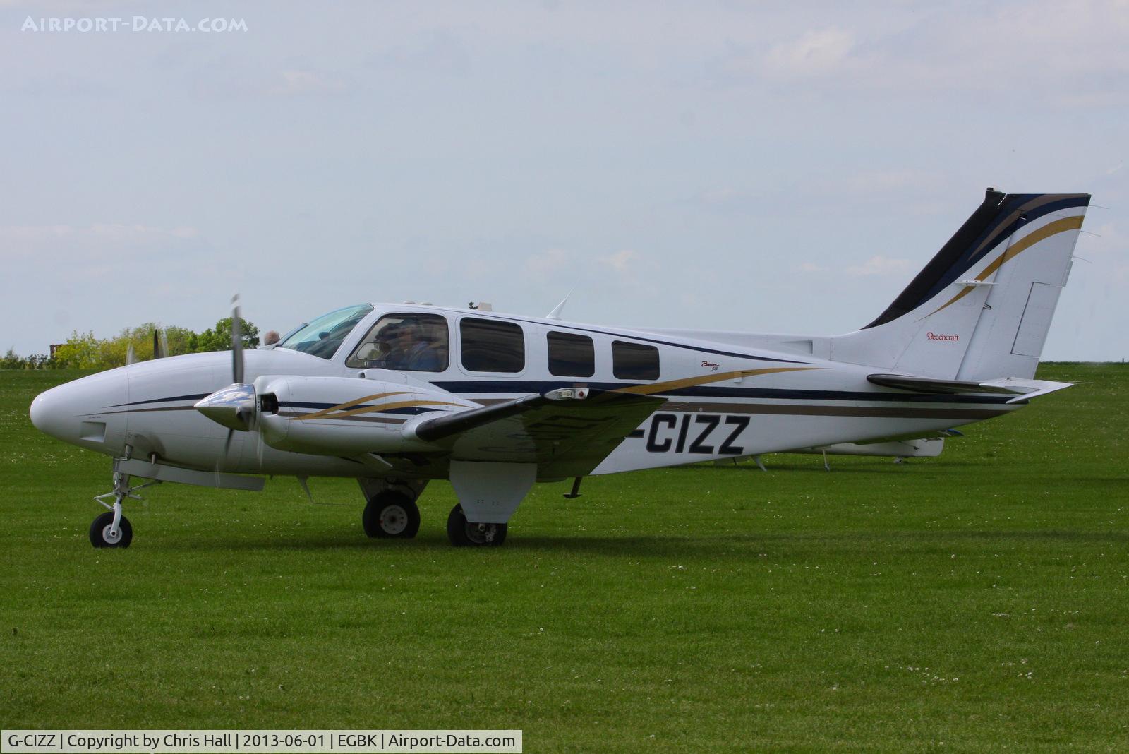 G-CIZZ, 2002 Beech 58 Baron C/N TH-2041, at AeroExpo 2013