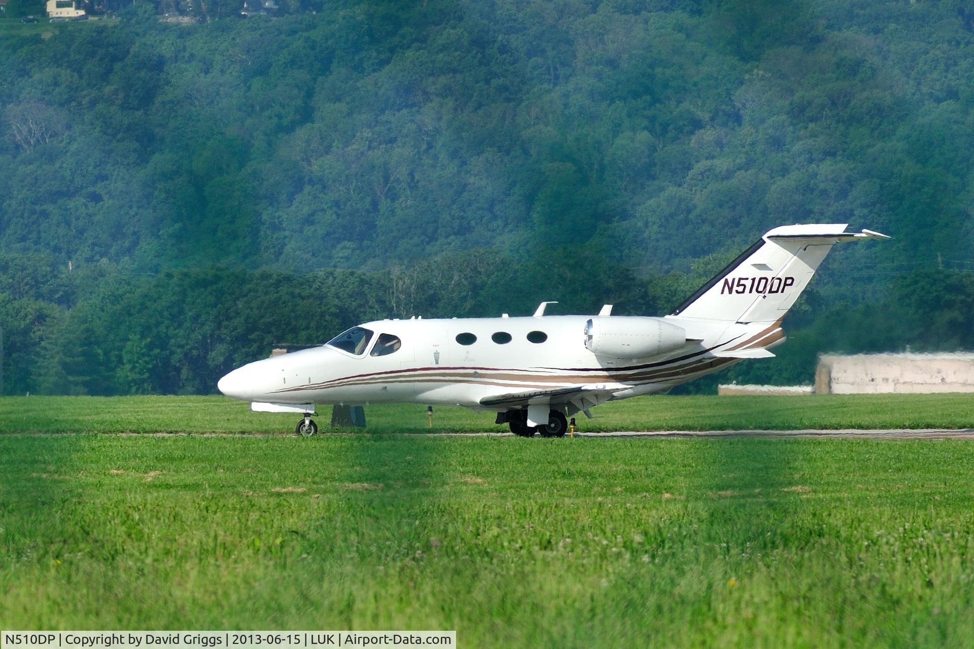 N510DP, Cessna 510 Citation Mustang C/N 510-0220, Taken thru the fence at Lunken Airport in Cincinnati Ohio.   This plane was preparing for departure around 8:15 a.m. on Saturday, June 15, 2013.   The Solar Impulse plane was at the airport at this time.