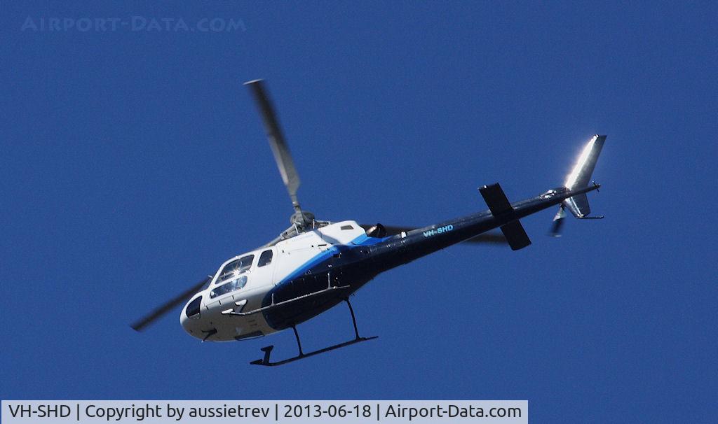 VH-SHD, 2001 Eurocopter AS-350B-2 Ecureuil C/N 3423, Low flying over my property today in the morning sun.
