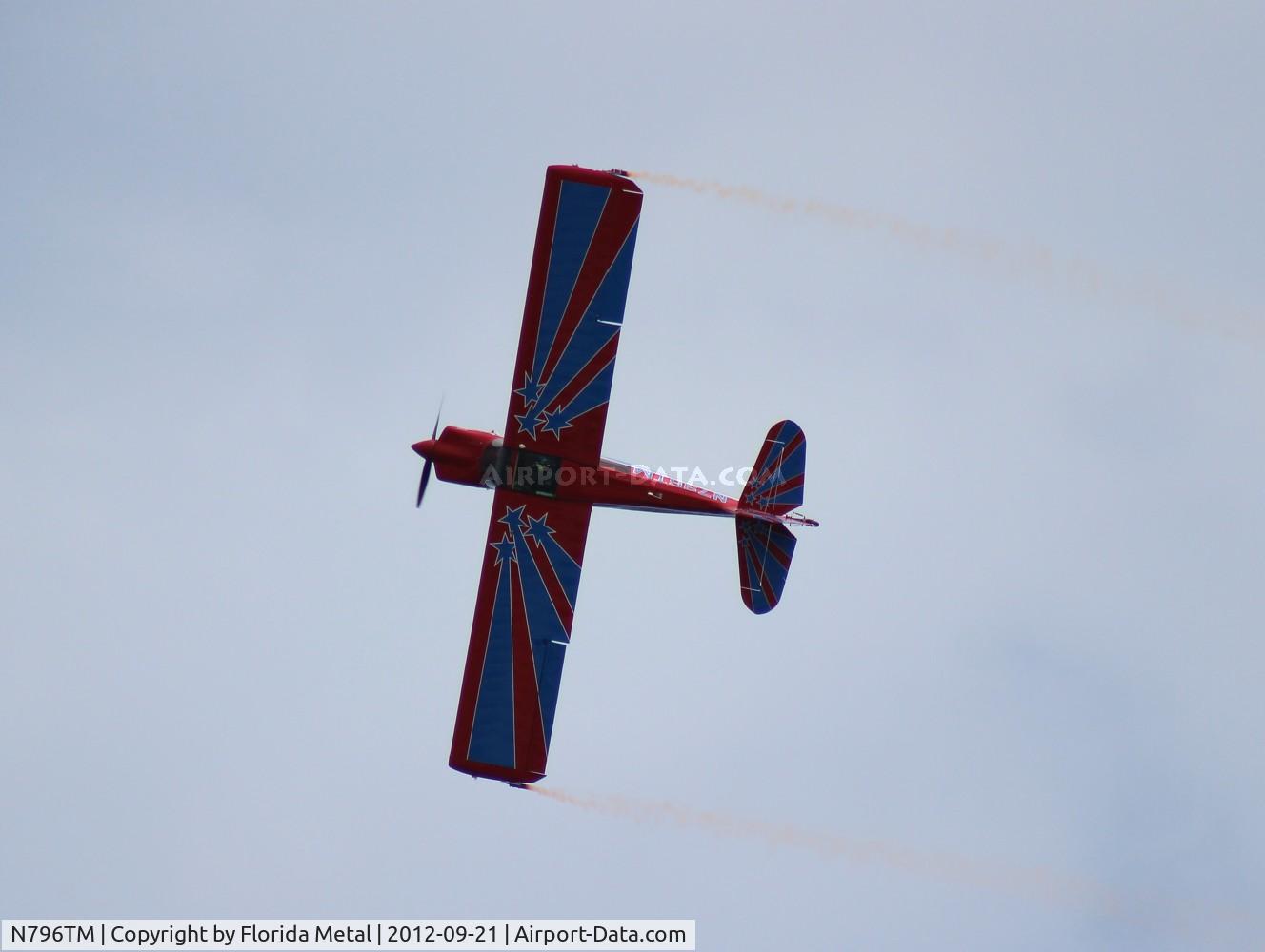 N796TM, 1996 American Champion 8KCAB Super Decathlon C/N 779-96, John Black flying aerobatic over Cocoa Beach