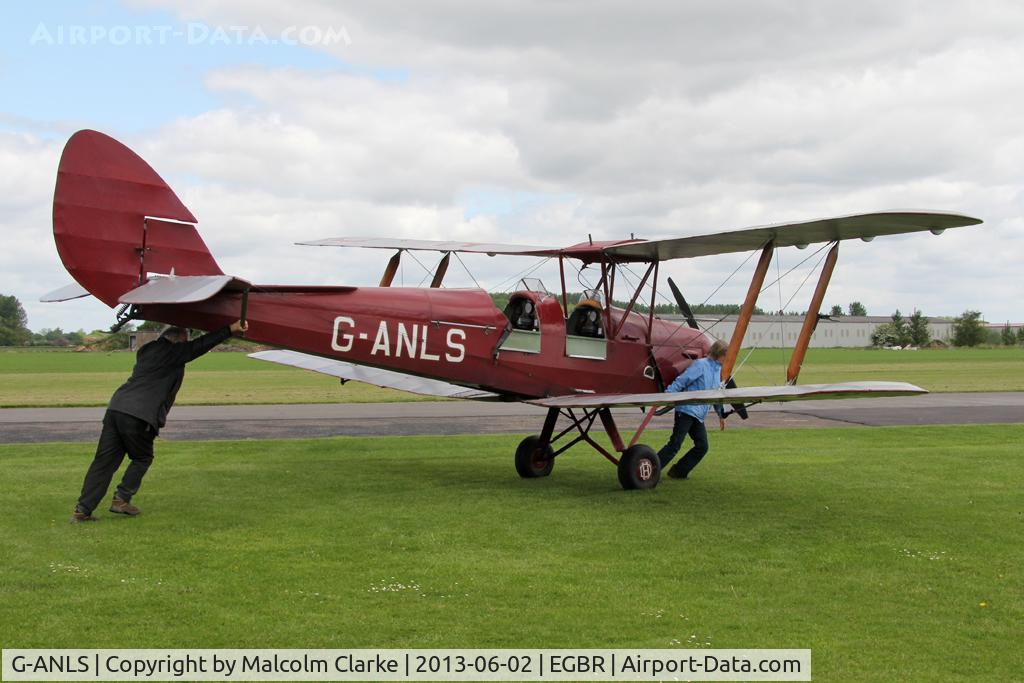 G-ANLS, 1944 De Havilland DH-82A Tiger Moth II C/N 85862, De Havilland DH-82A Tiger Moth II. Man power for a move to the pumps. At The Real Aeroplane Club's Jolly June Jaunt, Breighton Airfield, 2013.