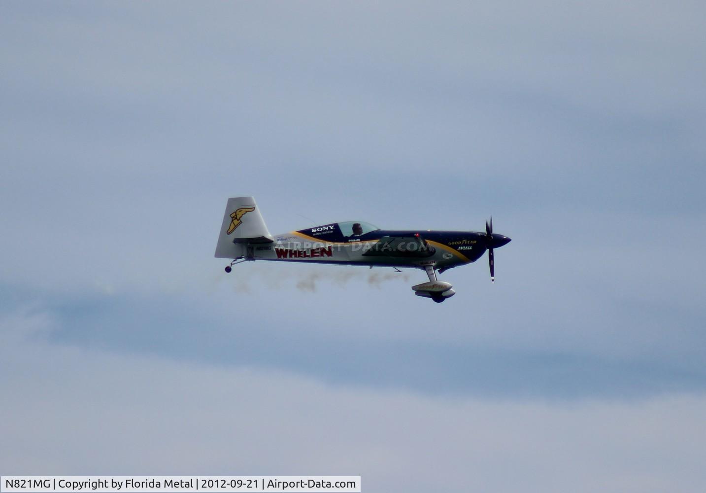 N821MG, 2006 Extra EA-300S C/N 1035, Mike Goulian Extra 300S over Cocoa Beach