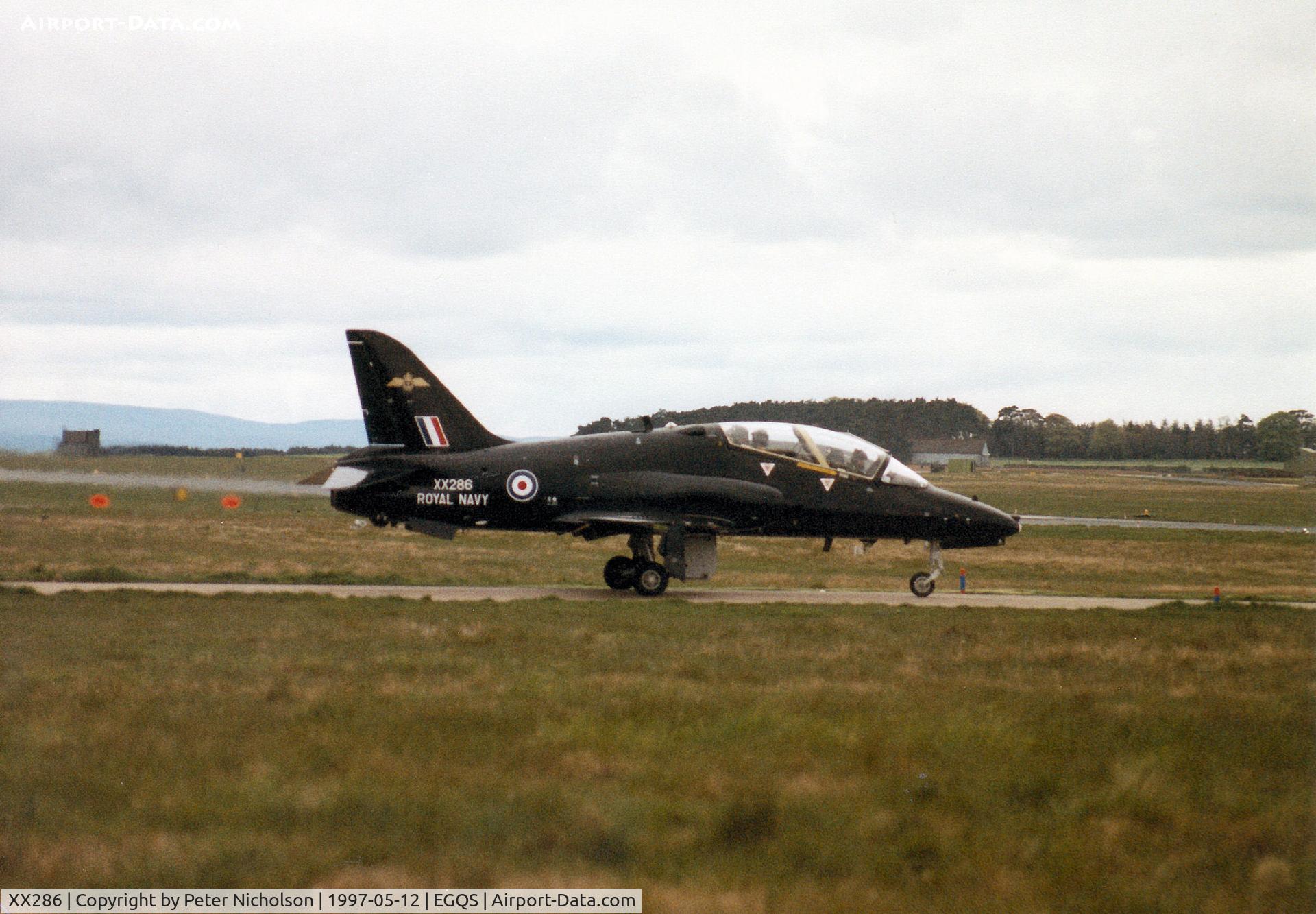 XX286, 1979 Hawker Siddeley Hawk T.1A C/N 112/312111, Hawk T.1A of the Royal Navy's Fleet Requirements & Direction Unit (FRADU) awaiting clearance to join the active runway at RAF Lossiemouth in May 1997.