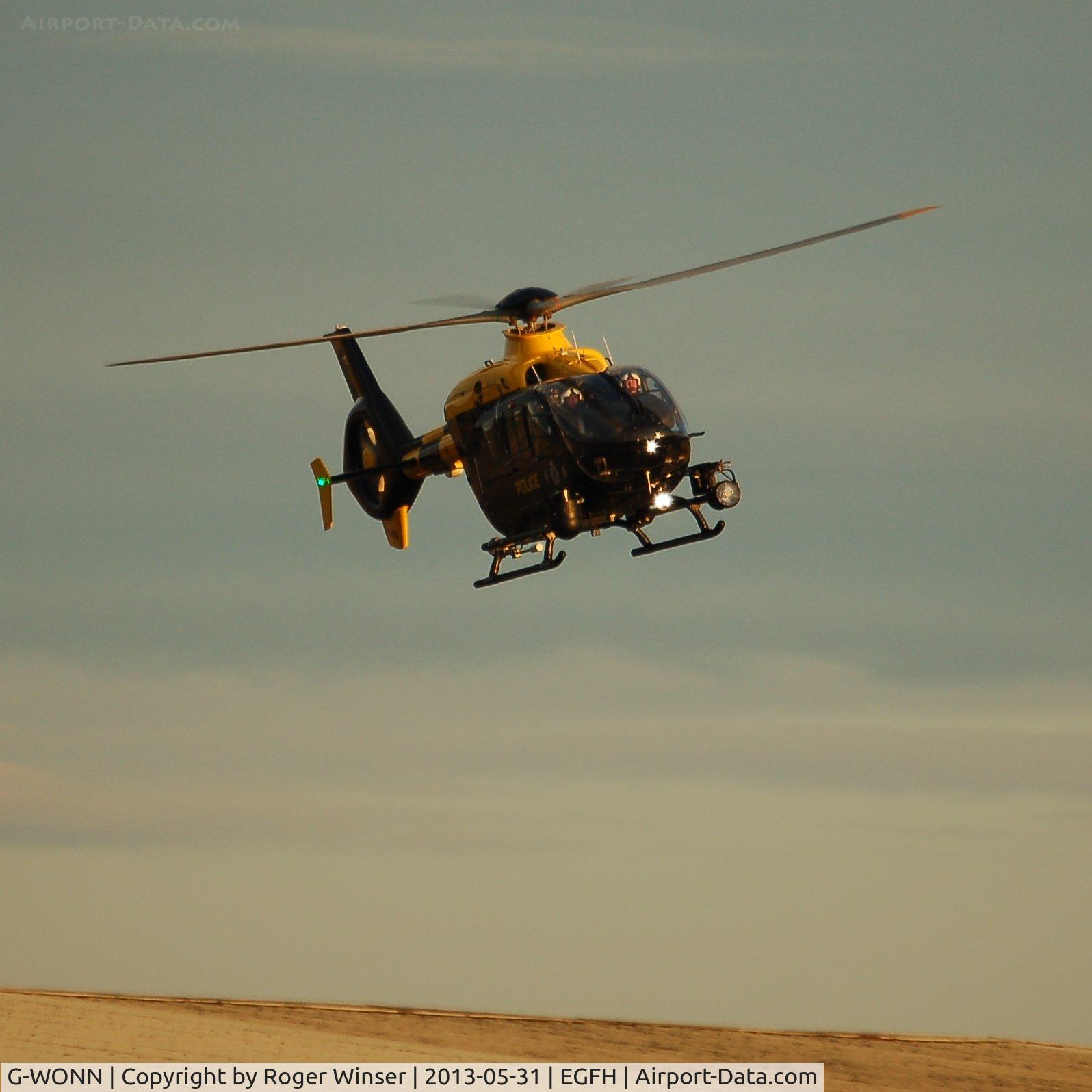 G-WONN, 2007 Eurocopter EC-135T-2+ C/N 0597, South and East Wales Police Air Support Unit helicopter (Police 32/Whiskey Oscar 99) arriving at Swansea Airport.  