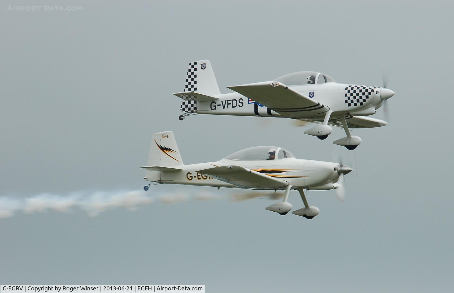 G-EGRV, 2007 Vans RV-8 C/N PFA 303-13639, Resident Vans RV-8 duo in a low pass with G-EGRV formating on G-VFDS.
