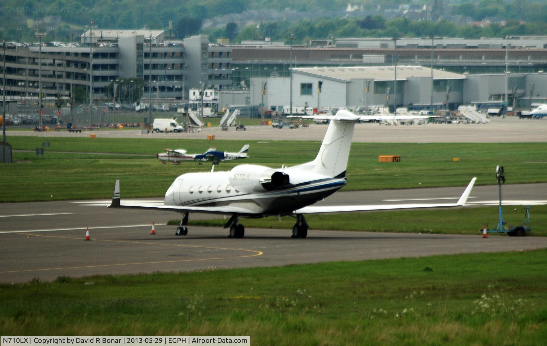 N710LX, 1996 Gulfstream Aerospace G-IV SP C/N 1297, Sitting on Block 30, the usual remote stand for visitors to Edinburgh.