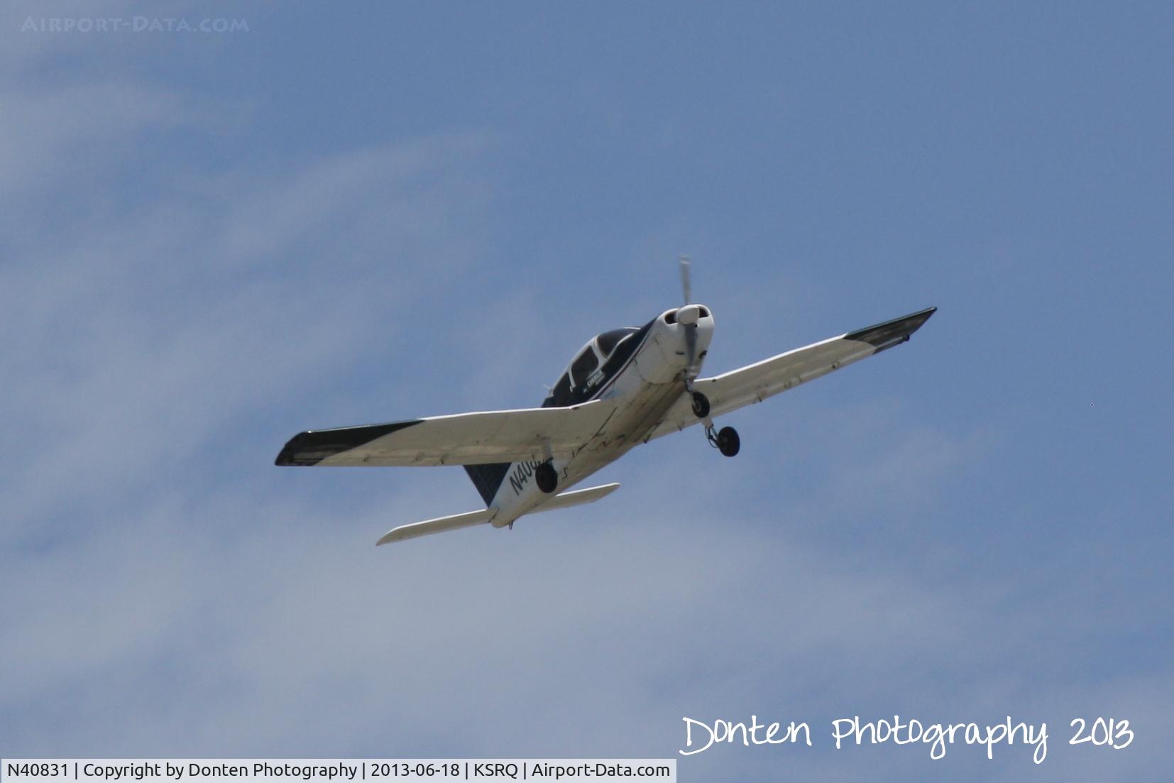 N40831, 1973 Piper PA-28-151 C/N 28-7415092, Piper Cherokee (N40831) departs Runway 14 at Sarasota-Bradenton International Airport