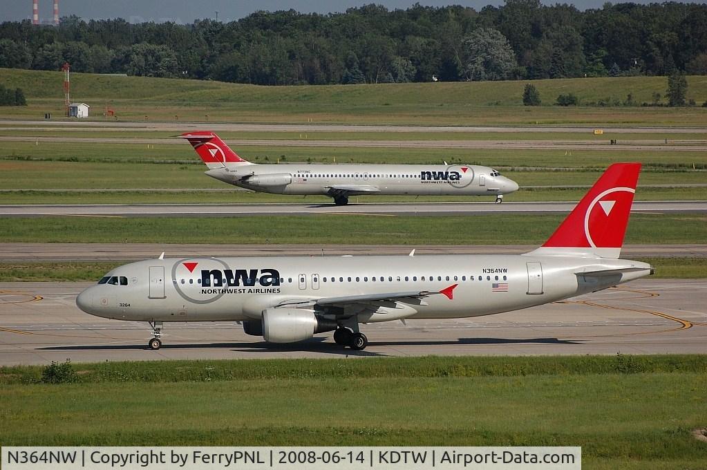 N364NW, 1999 Airbus A320-212 C/N 0962, NWA A320 passing a DC9
