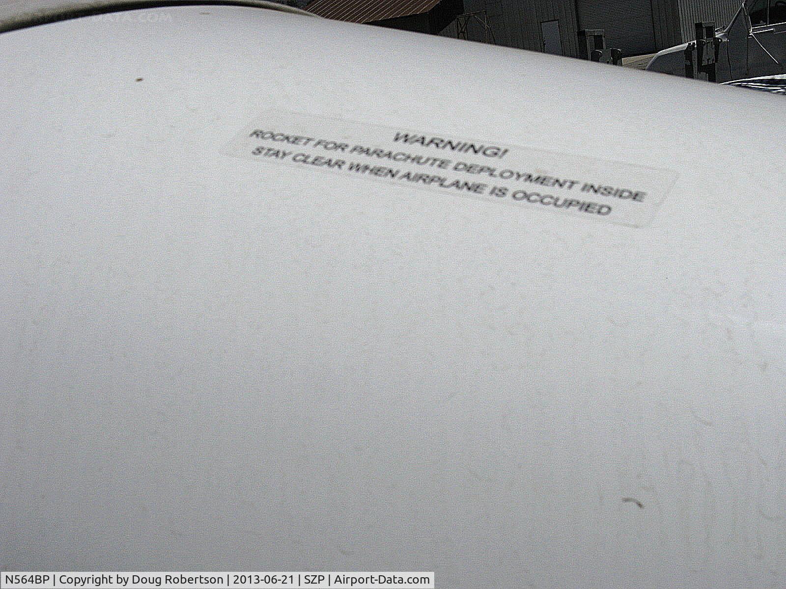 N564BP, 2001 Cirrus SR22 C/N 0135, 2001 Cirrus SR22, Continental IO-550-N 300 Hp, warning for Cirrus CAPS-Cirrus Airframe Parachute System by BRS-Ballistic Recovery Systems, Inc. partly owned by Cirrus.