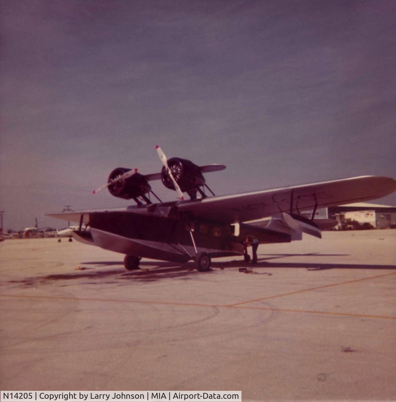 N14205, 1934 Douglas Dolphin 8 C/N 1280, I shot this on the General Aviation Ramp of Miami International Airport in the early 1970's.