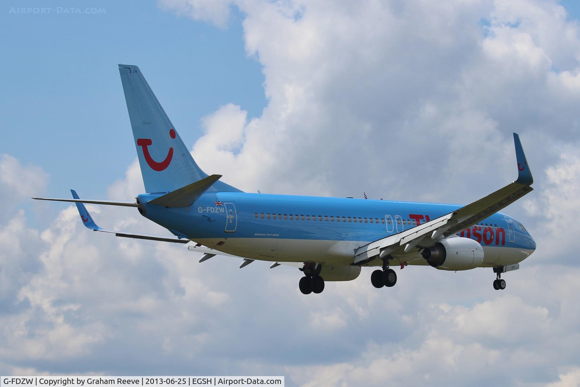 G-FDZW, 2011 Boeing 737-8K5 C/N 37254, About to touch down at Norwich.