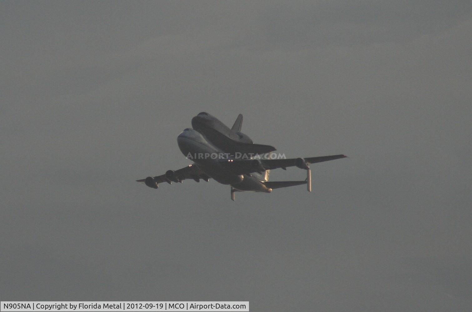 N905NA, 1970 Boeing 747-123 C/N 20107, NASA 747 with shuttle flying over Orlando International Airport