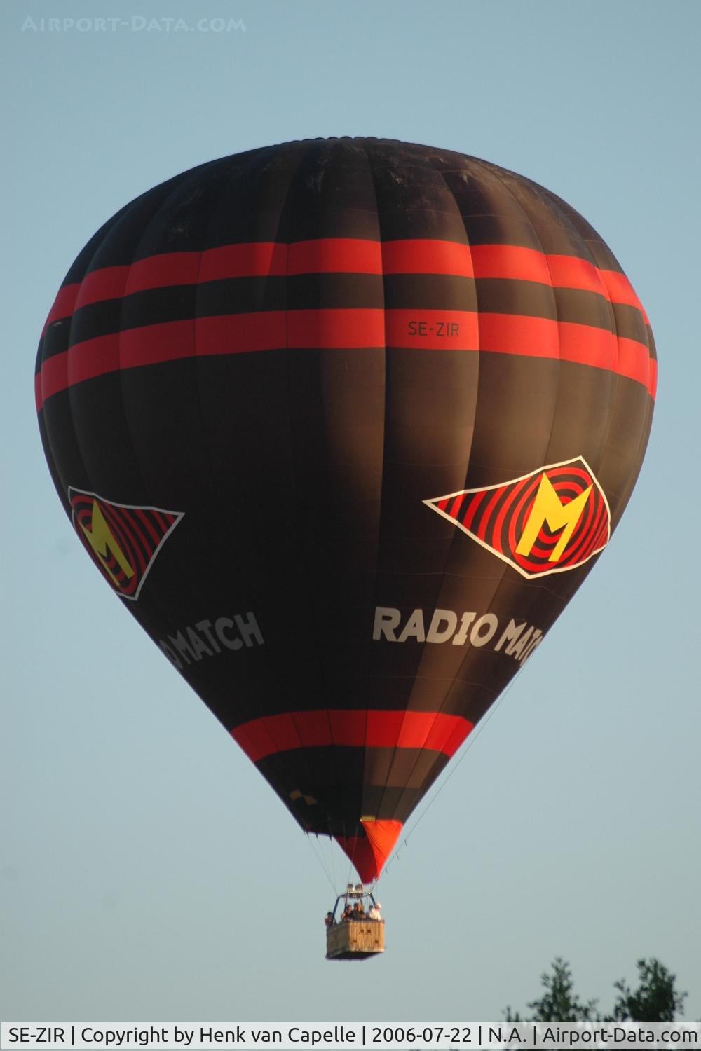 SE-ZIR, 2005 Cameron Thunder AX11-250-S2 C/N 10647, Cameron balloon with Radio Match advertisements taking off in Linköping, Sweden.