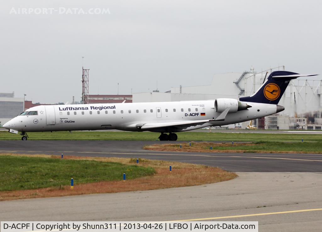 D-ACPF, 2001 Canadair CRJ-701ER (CL-600-2C10) Regional Jet C/N 10030, Taxiing holding point rwy 32R for departure...