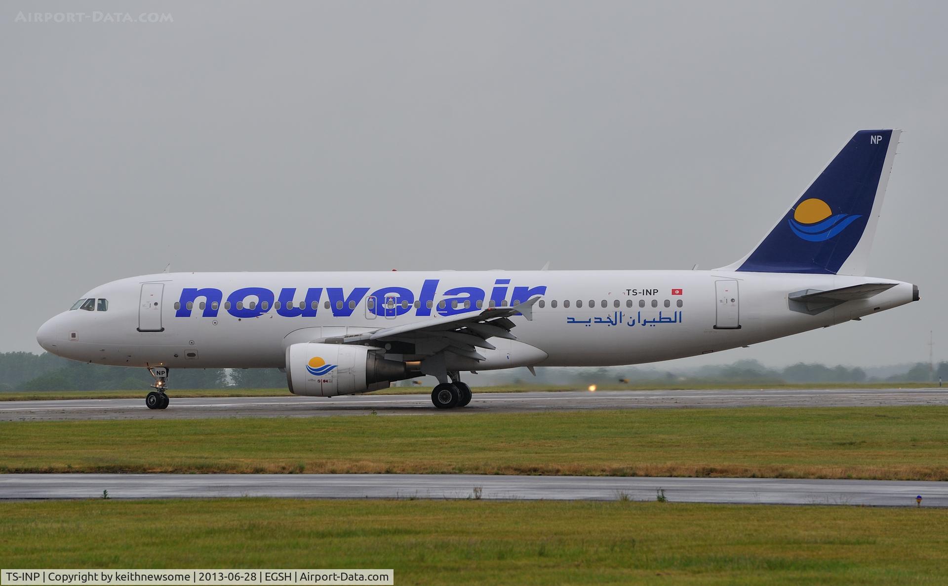TS-INP, 2001 Airbus A320-214 C/N 1597, Turning in the rain !