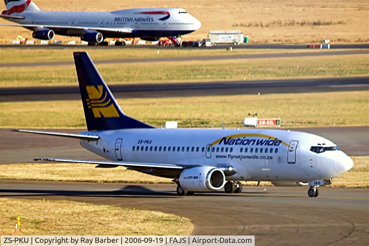 ZS-PKU, 1991 Boeing 737-529 C/N 25249, Boeing 737-529 [25249] (Nationwide Air) Johannesburg Int~ZS 19/09/2006. Taken through the glass of the terminal building.