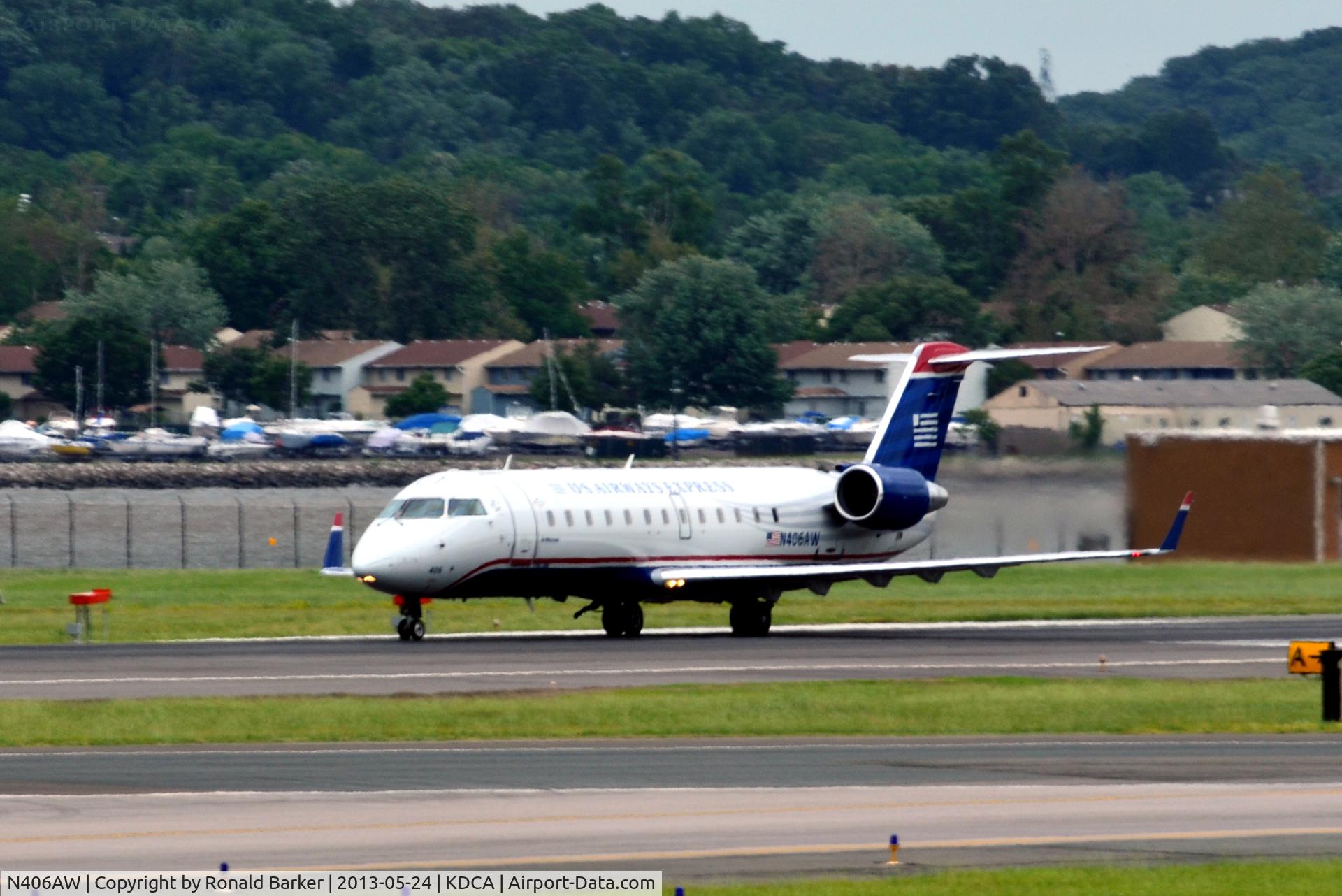N406AW, 2000 Bombardier CRJ-200LR (CL-600-2B19) C/N 7402, Takeoff DCA
