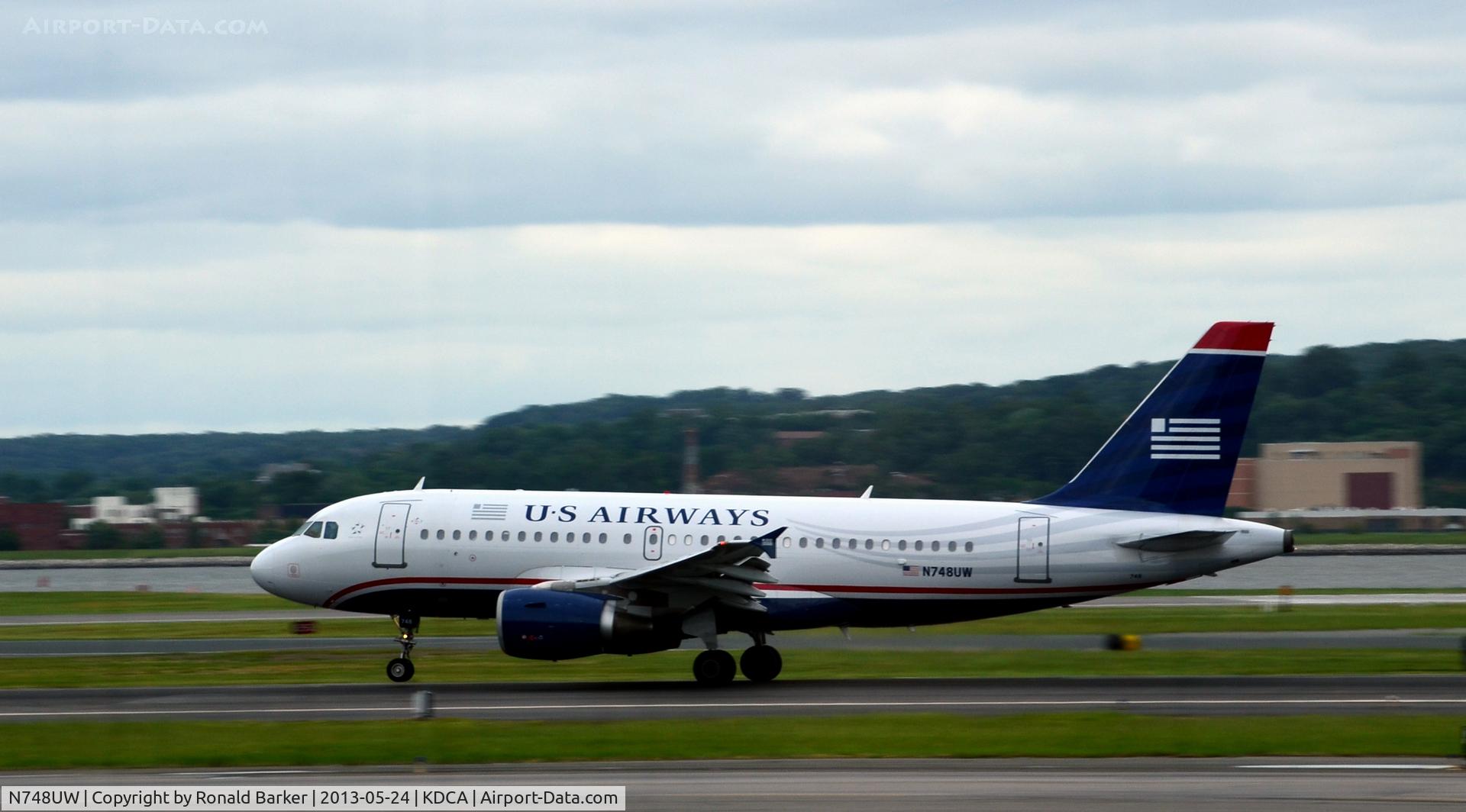 N748UW, 2000 Airbus A319-112 C/N 1311, Nose wheel liftoff DCA