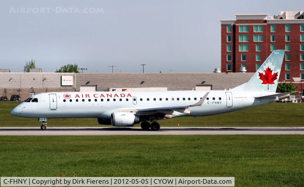 C-FHNY, 2007 Embraer 190AR (ERJ-190-100IGW) C/N 19000085, Beginning its takeoff run down rwy 25.