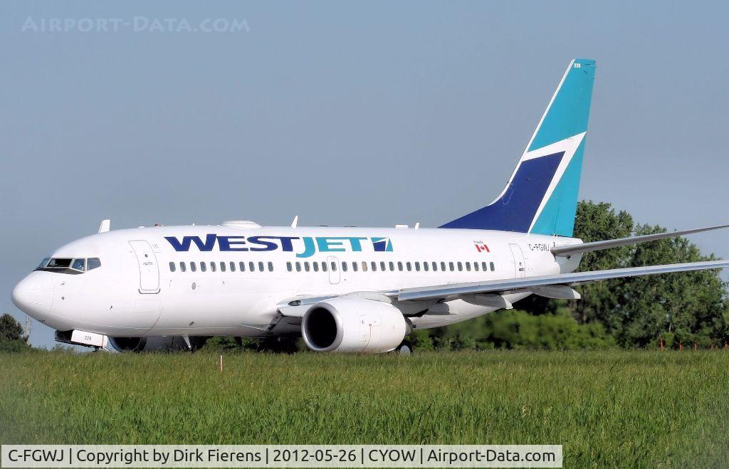 C-FGWJ, 2004 Boeing 737-7CT C/N 32764, Seconds from there takeoff run.