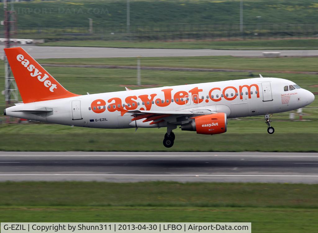 G-EZIL, 2005 Airbus A319-111 C/N 2492, Landing rwy 14R with additional 'Spirit of Easyjet' titles