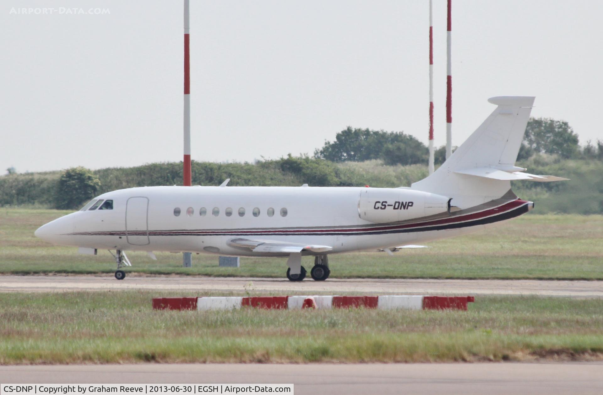 CS-DNP, 2000 Dassault Falcon 2000 C/N 109, Parked at Norwich.