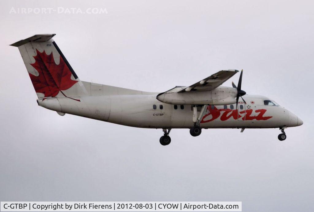 C-GTBP, 1987 De Havilland Canada DHC-8-102 Dash 8 C/N 066, Approaching rwy 32 and on short final.