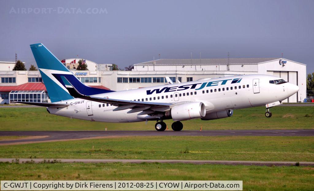 C-GWJT, 2011 Boeing 737-7CT C/N 40338, Mid-morning takeoff from Ottawa