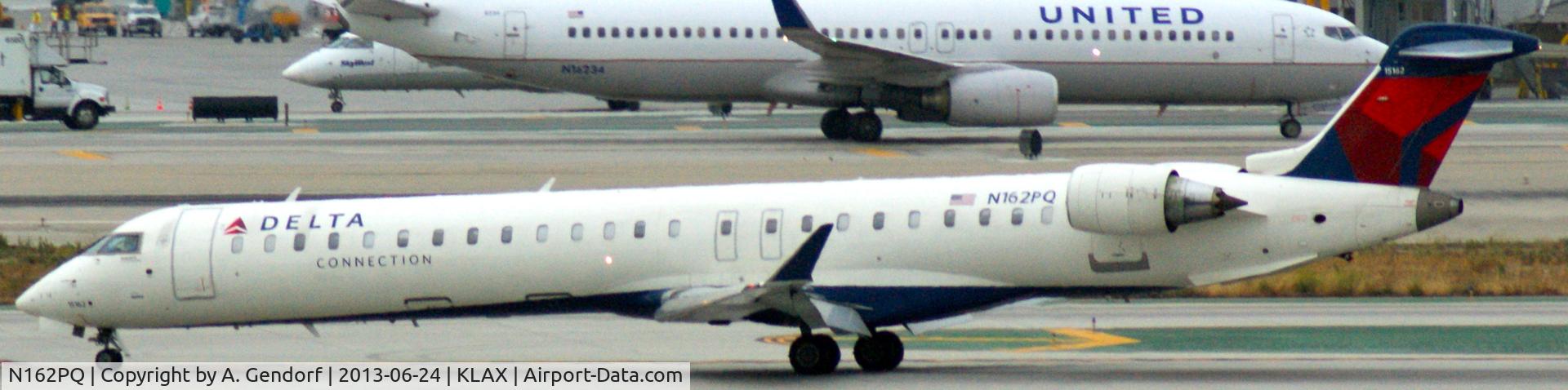 N162PQ, 2008 Bombardier CRJ-900ER (CL-600-2D24) C/N 15162, Sky West (Delta Connection cs.), seen here taxiing at Los Angeles Int´l(KLAX)
