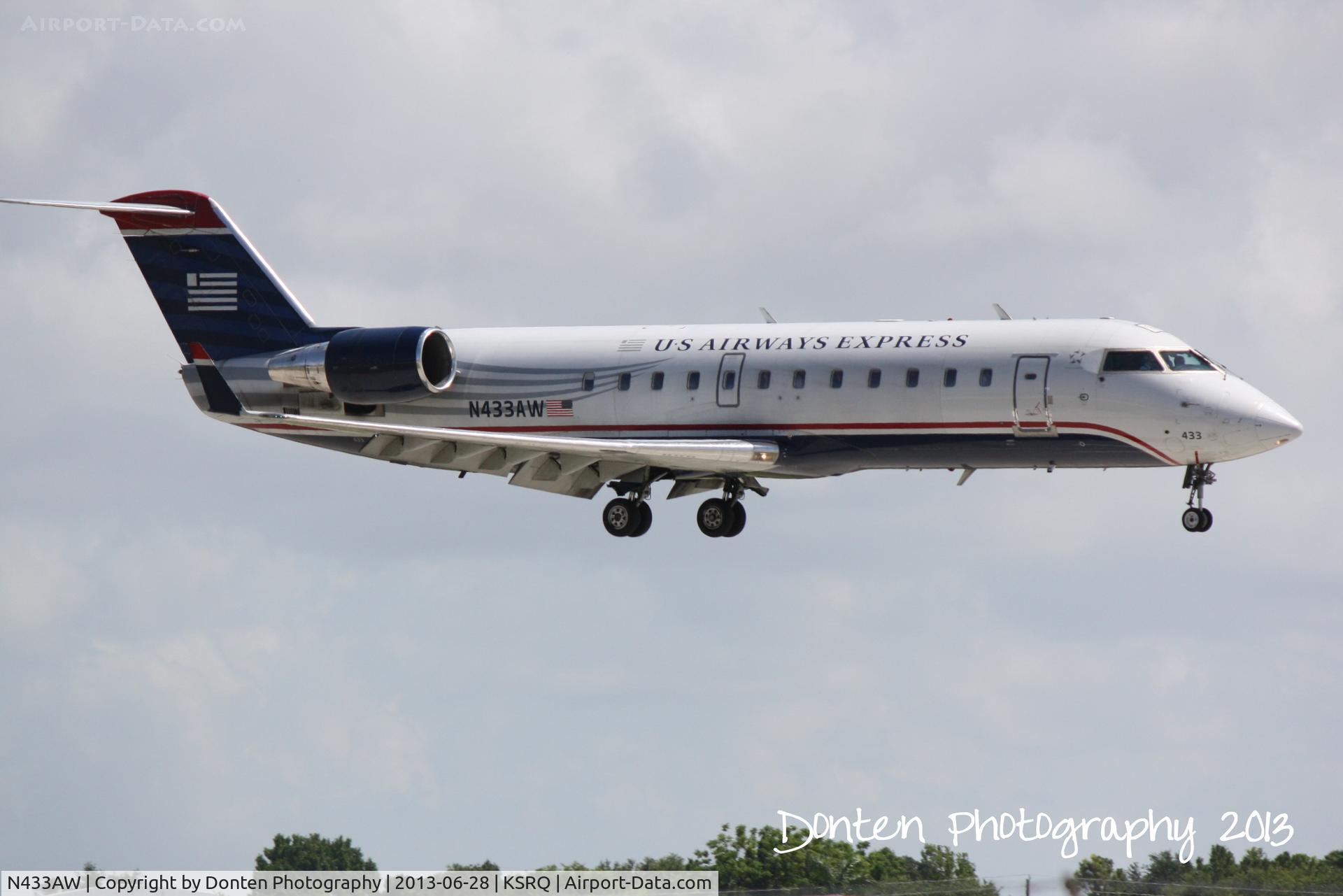 N433AW, 1999 Canadair CRJ-200LR (CL-600-2B19) C/N 7289, US Air Flight 3633 operated by Air Wisconsin (N453AW) arrives at Sarasota-Bradenton International Airport following a flight from Reagan National Airport