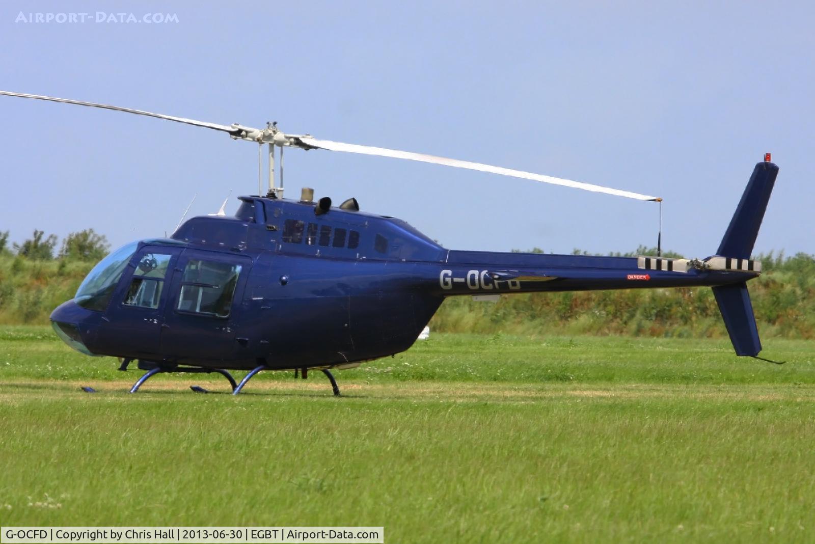 G-OCFD, 1980 Bell 206B JetRanger III C/N 3165, being used for ferrying race fans to the British F1 Grand Prix at Silverstone