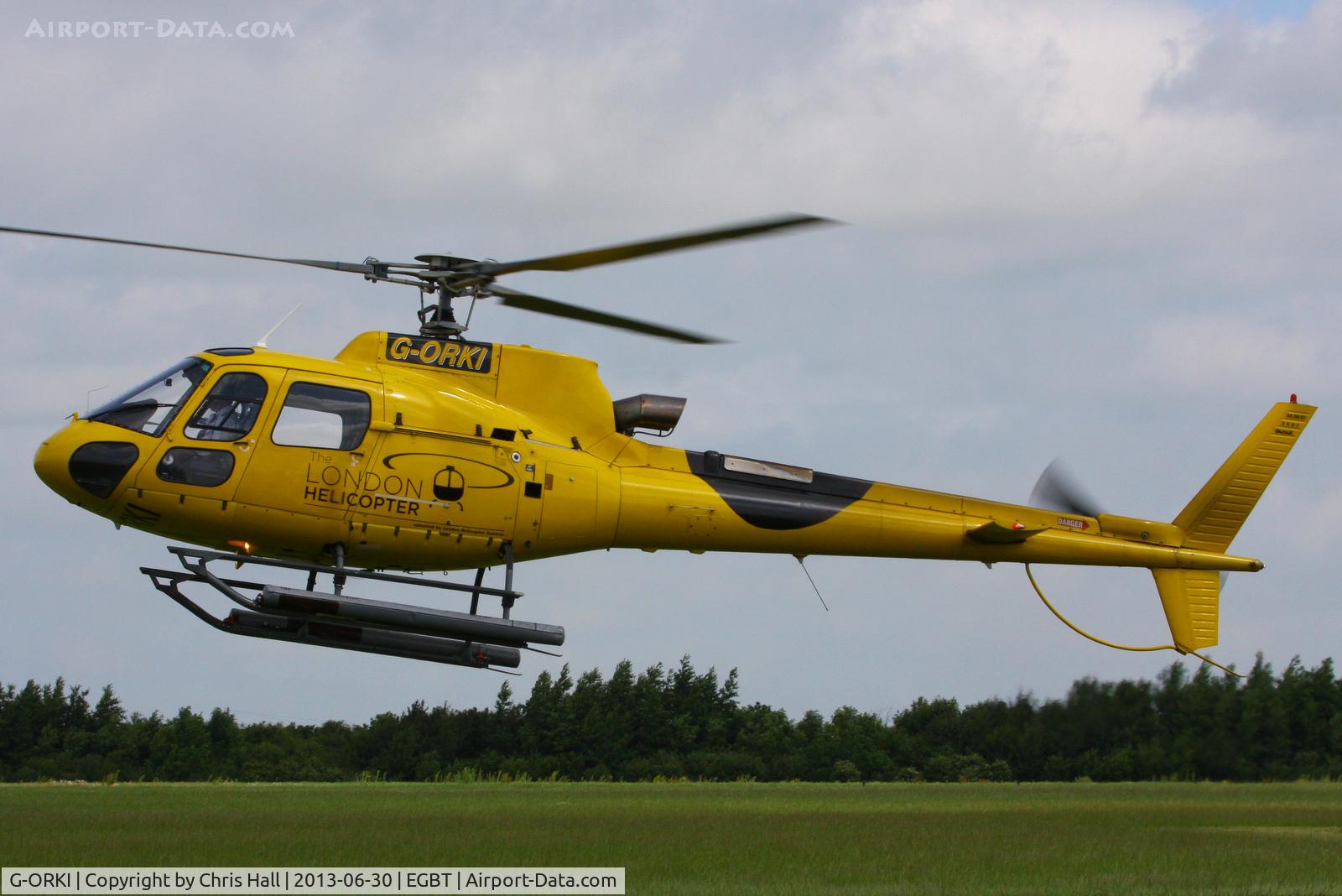G-ORKI, 2002 Eurocopter AS-350B-3 Ecureuil Ecureuil C/N 3587, being used for ferrying race fans to the British F1 Grand Prix at Silverstone