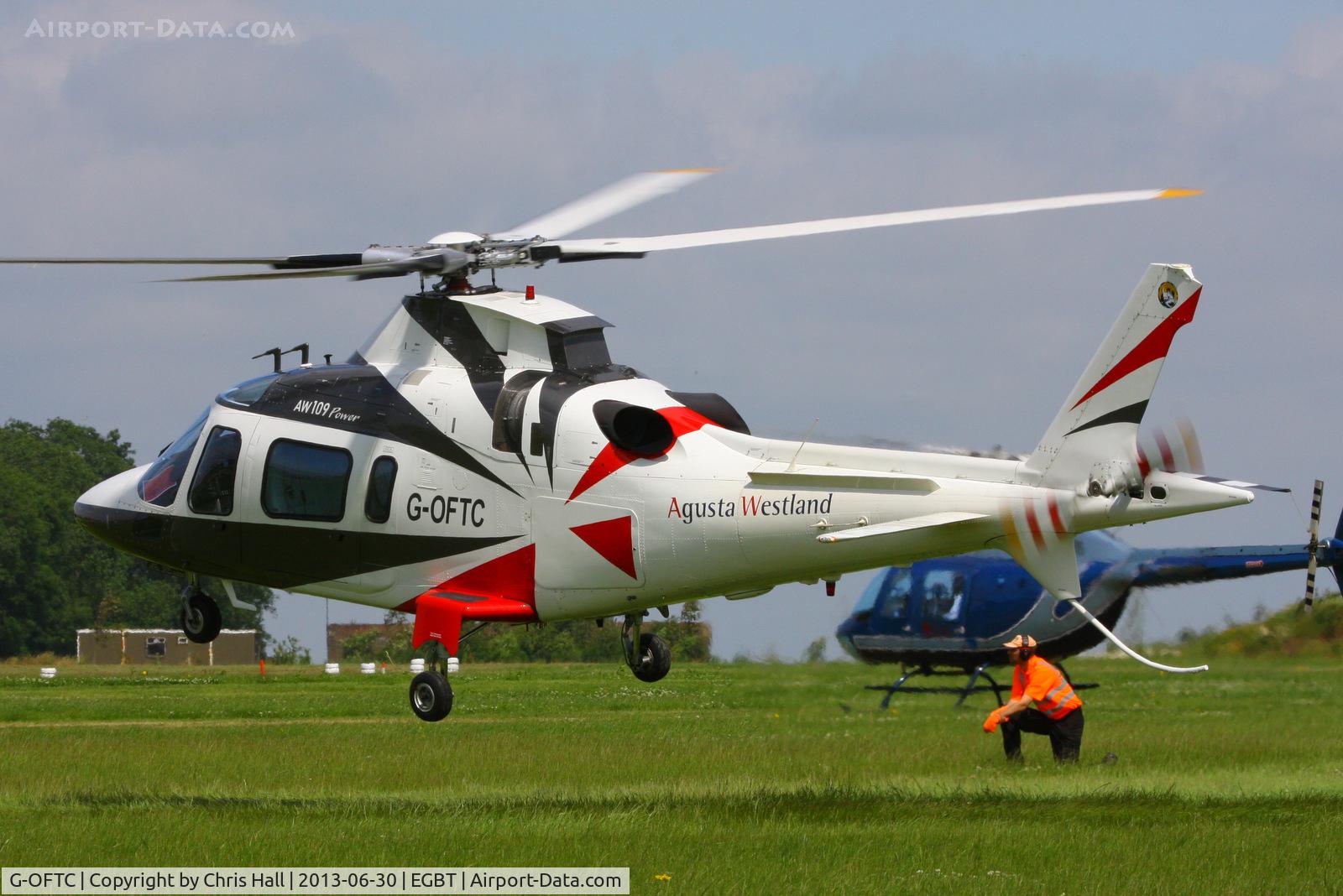 G-OFTC, 1999 Agusta A-109E Power C/N 11043, being used for ferrying race fans to the British F1 Grand Prix at Silverstone