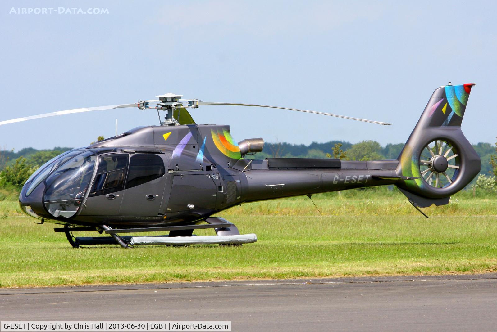 G-ESET, 2009 Eurocopter EC-130B-4 (AS-350B-4) C/N 4817, being used for ferrying race fans to the British F1 Grand Prix at Silverstone