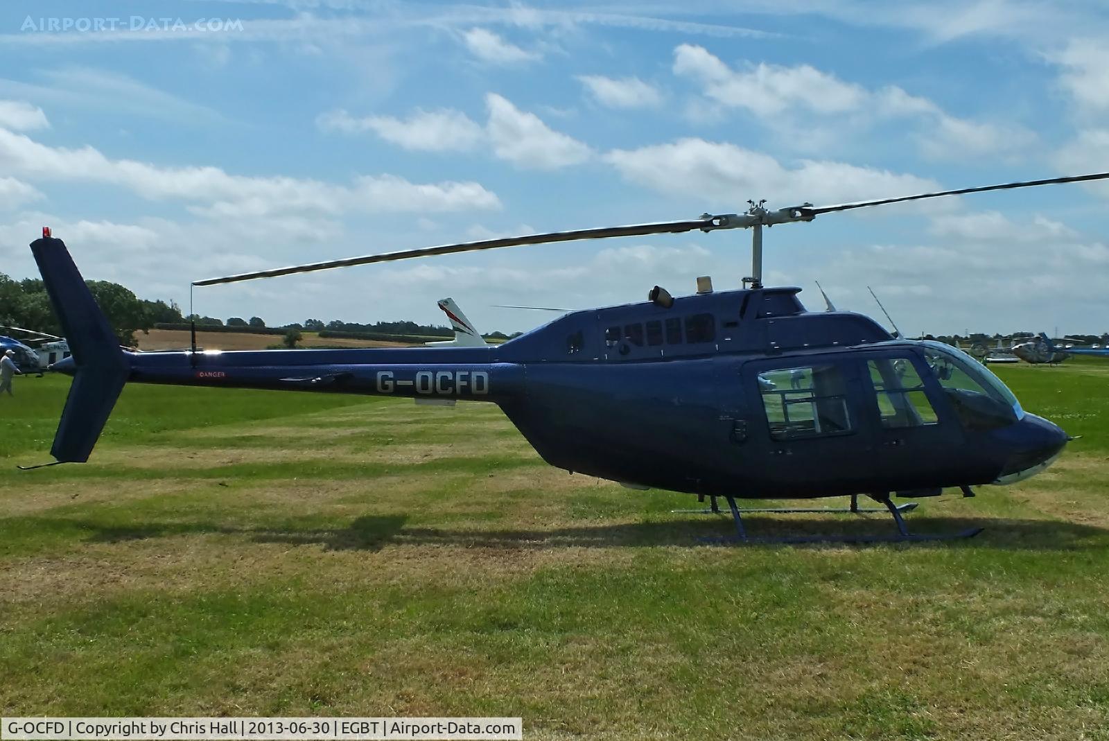 G-OCFD, 1980 Bell 206B JetRanger III C/N 3165, being used for ferrying race fans to the British F1 Grand Prix at Silverstone
